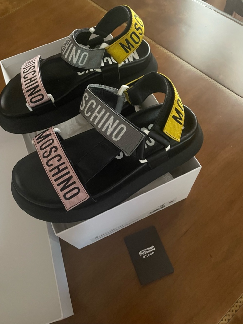 Moschino women Black Sandals with Pink, Gray & Yellow Logo Straps
